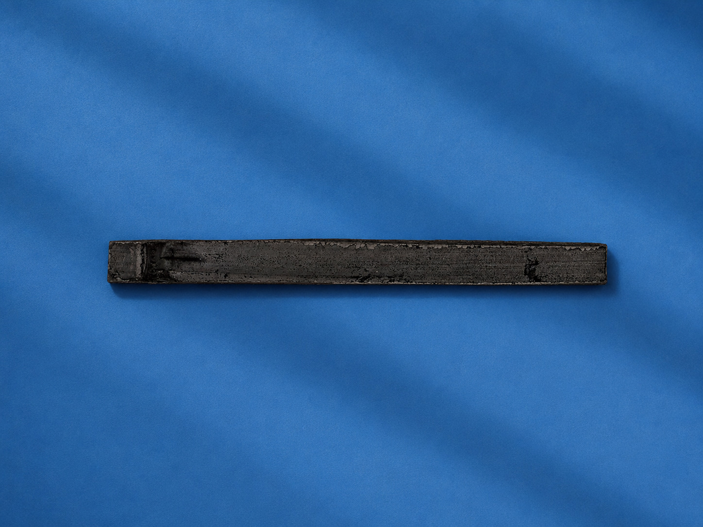 Bâtons plats de takesumi (charbon de bambou) de Chine, gros plan sur la matière